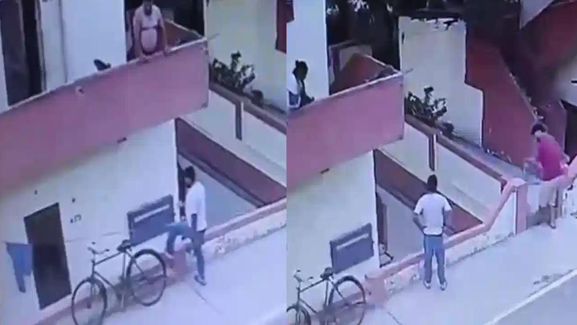 బాల్కనీలో నిలబడి ఐస్‌క్రీమ్ అందుకుంటుండగా..